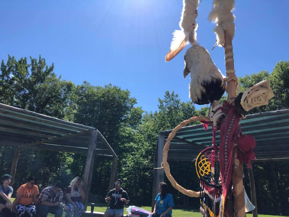eagle head staff at a pow wow 